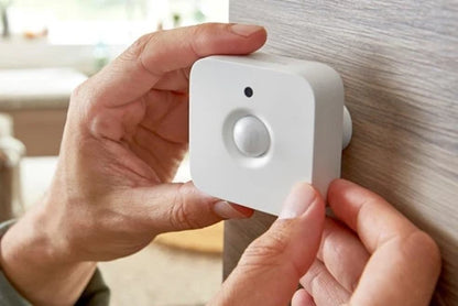 Philips HUE Motion Sensor in hands